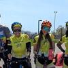 Five bikers stand together with their bicycles and gear, posing for a photo during the annual Temple Ambler Bike Tour.