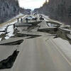 damaged roadway after an earthquake