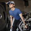 student lifting weights