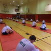 cadets stretching in the gym