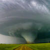 A tornado moving across the countryside