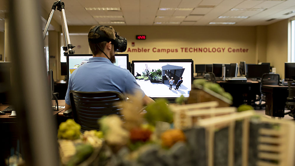 student using VR headset