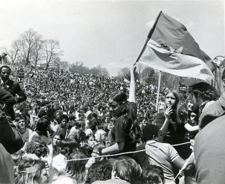 black and white photo of a large crowd from the original earth day in 1970. 