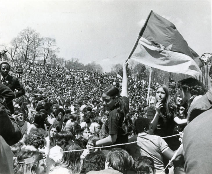 black and white photo of a large crowd from the original earth day in 1970.