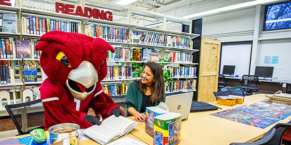 hooter and a student reading