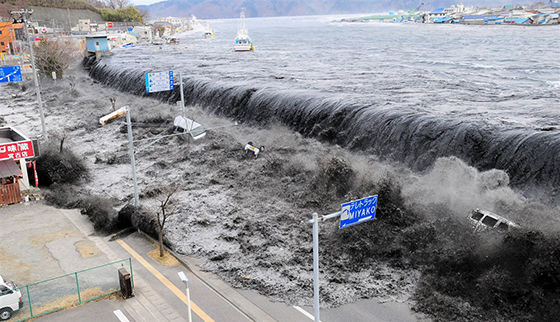 a tsunami hitting land